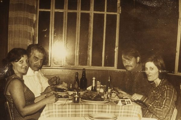 Josef Mengele (left rear) dining with his wife and guests in Brazil, circa 1960. Wikipedia
