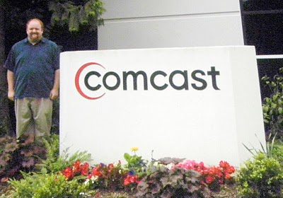 David vs. Goliath: Robb Topolski poses in front of Comcast Headquarters David vs. Goliath: Robb Topolski poses in front of Comcast Headquarters